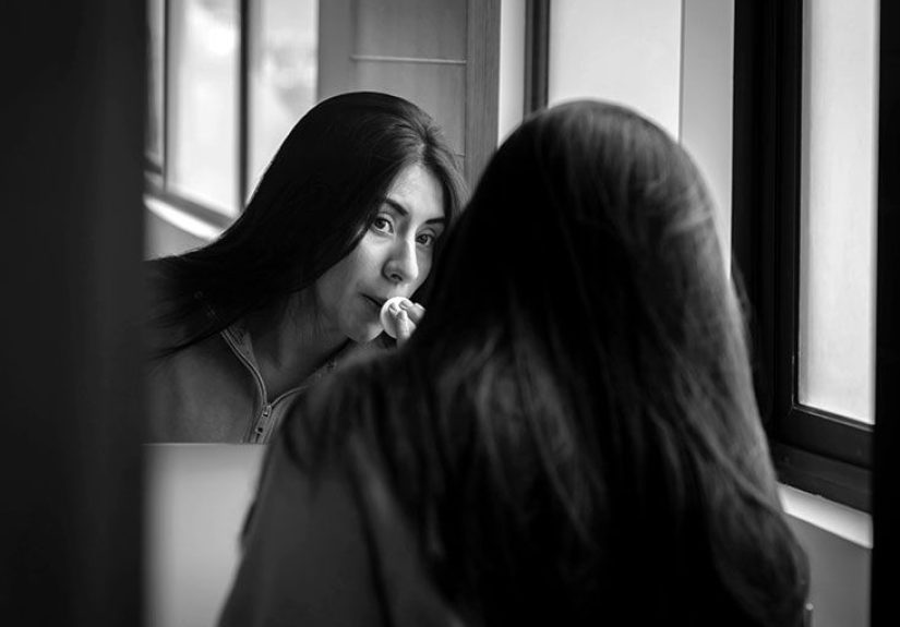 What are the oral symptoms of Kaposi sarcoma?